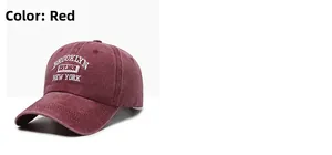 Close-up of vintage red baseball cap with detailed Brooklyn New York embroidery