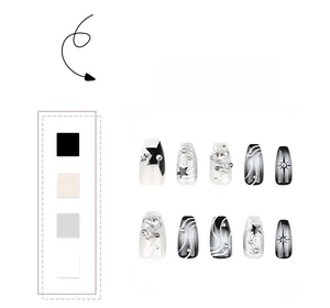 Detailed view of Y2K style press-on nails featuring silver stars and spiral glitter patterns