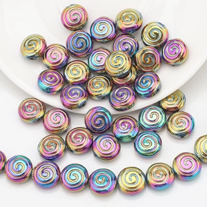 Macro detail of spiral rainbow plated crystal glass loose beads for DIY jewelry making
