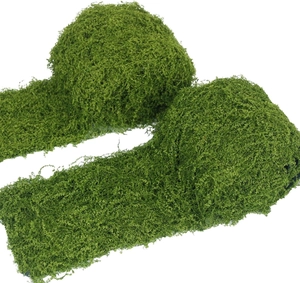 Macro detail of natural green artificial moss roll with realistic fiber texture