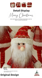 Detailed view of knitted Santa figurine with sequined gold snowflakes and soft white beard