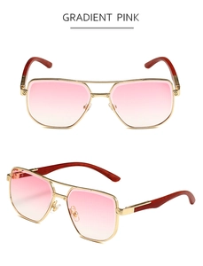 Detailed view of square aviator sunglasses with gradient pink lenses and wood grain temples