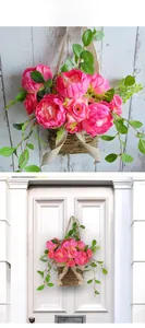 Close-up of pink artificial peony basket with rustic rattan and burlap bow detail