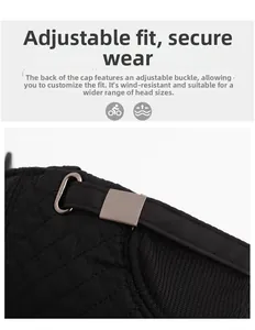 Detail of black quilted baseball cap featuring adjustable metal buckle and warm rib knit edge