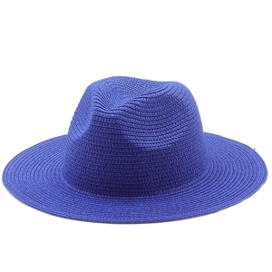 Classic dark blue straw panama hat with wide brim for summer sun protection and beach wear