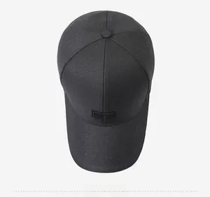Top view of a minimalist black baseball cap featuring a China mountain patch detail