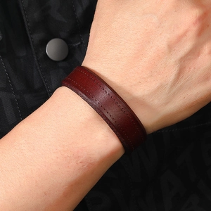 Punk rock style dark brown leather bracelet with double stitching for men on wrist