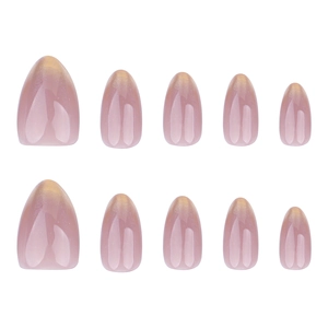 Faux ongles dégradés français rose poudré avec paillettes dorées élégantes