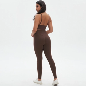 Chocolate brown two-piece yoga set with strappy sports bra and high waist leggings