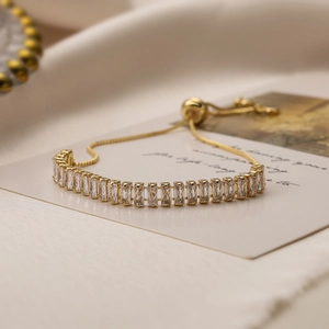 Adjustable gold plated rectangle zircon bracelet with sleek row of cubic zirconia stones
