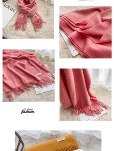 Detail of soft cashmere-like scarf showing fine texture and stylish tassel edges