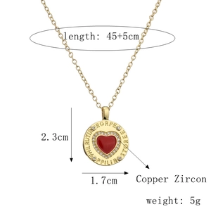 Detail view of heart pendant with zircon inlay and exact product measurements