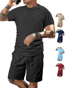 Detailed view of the textured waffle knit fabric on a men's casual short sleeve set