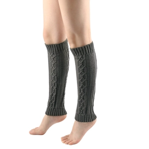 Thick knit cable leg warmers in dark grey for women with ribbed texture and slouchy fit