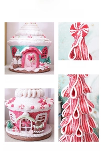 Detail of handmade polymer clay candy house with glitter finish and gingerbread decor