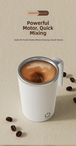 Close-up of a white automatic coffee stirring mug creating a rapid vortex on a desk