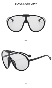 Front and side views of large-frame cycling sunglasses with black frames and grey lenses