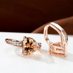 Elegant heart-shaped champagne gemstone earrings in rose gold setting with white zircon