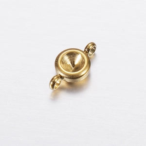 Polished gold stainless steel circular bezel connector with dual loops on gray surface