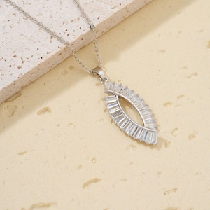 Elegant silver necklace featuring hollow marquise pendant with baguette-cut cubic zirconia