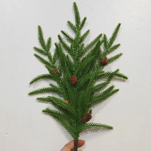 Realistic Norfolk pine branch with green needles and brown pine cones for Christmas decor