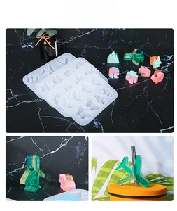 Detailed view of DIY silicone straw topper molds featuring cat, star, and plane shapes