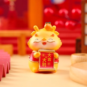 Macro shot of a cute yellow dragon figurine holding a lucky scroll with festive background