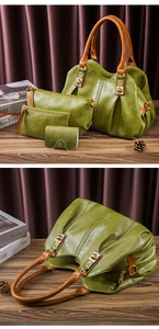 Detail view of a 4-piece green PU leather handbag set with brown handles on a wooden table