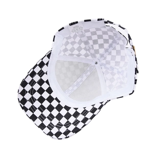 Inside view of black and white checkerboard cotton baseball cap with quality stitching
