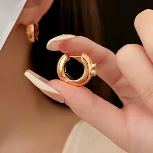 Luxury gold minimalist round hoop earrings with clover flower accent for women