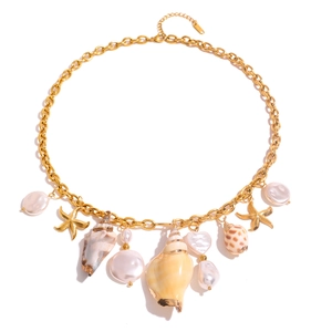Gold chunky chain necklace with pearls, natural shells, and starfish pendants on white background