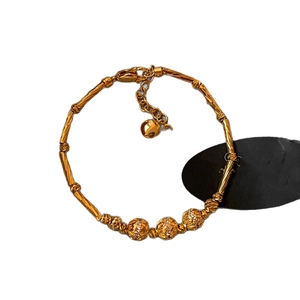 18K gold plated bamboo link bracelet with zircon-studded carved beads and adjustable chain
