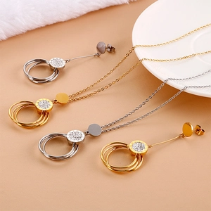 Elegant gold and silver circular pendant necklaces and stud earrings jewelry set
