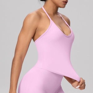 Pink halter neck yoga tank top with built-in pads and criss-cross back design for women