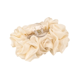 Elegant beige chiffon flower hair claw clip with large bow and satin texture on white background
