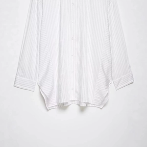 Women's casual loose white shirt featuring stylish black vertical and horizontal stripes