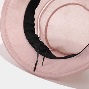 Foldable pink sun hat with breathable mesh and adjustable inner strap detail