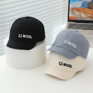 Kids short brim baseball caps in black, grey and beige with nice smile embroidery