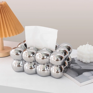 Nordic silver bubble ceramic tissue box with a reflective metallic mirror finish