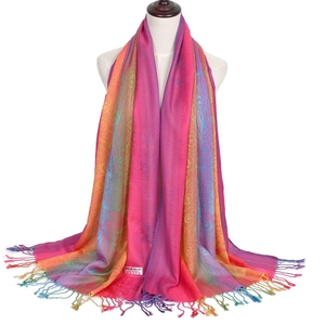 Detail of pashmina scarf label showing 70% cashmere and 30% silk blend with fringe