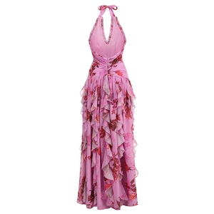 Detail of pink floral halter dress showing layered ruffle hem and chiffon texture