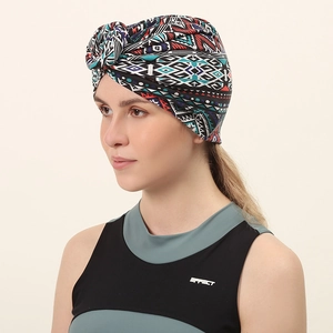 Bohemian turban with colorful geometric patterns and decorative twist design for women