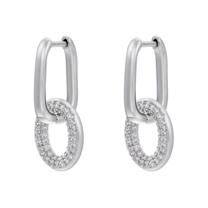 Detail of U-shaped silver earrings with sparkling pink heart and pave-set zircons