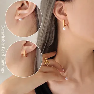 Goldene geometrische Perlenohrringe und verstellbarer Herzring als Schmuckset für Damen