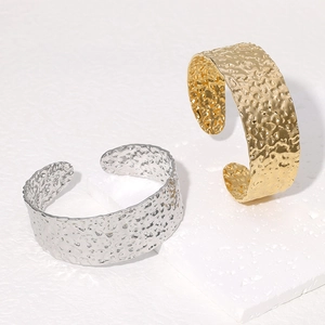 Irregular hammered wide cuff bracelets in gold and silver finish stainless steel