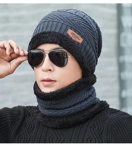 Close-up of winter knit hat and neck warmer with thick black fleece lining