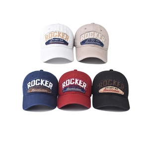 Collection of retro washed cotton baseball caps with ROCKER embroidery in five colors