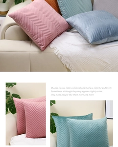 Macro detail of velvet pillowcase showing embossed chevron texture in multiple colors