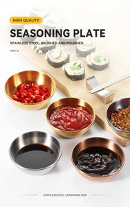 Close-up of colorful brushed stainless steel seasoning dishes in a dining setting
