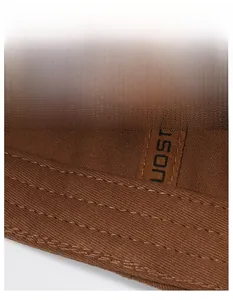 Detail of widened sweatband with triple-row stitching on a twill fabric baseball cap